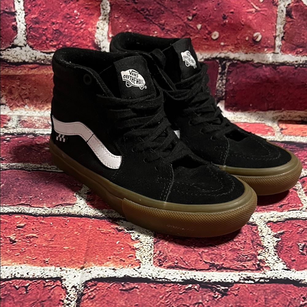 Vans Black and White High-Top Sneakers